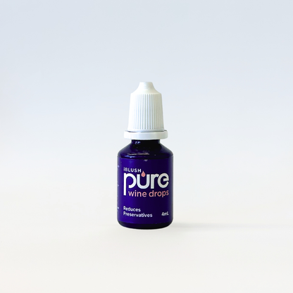 Bottle of 'pure' wine drops on a white background